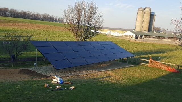 ground mounted solar panels in a rural back yard