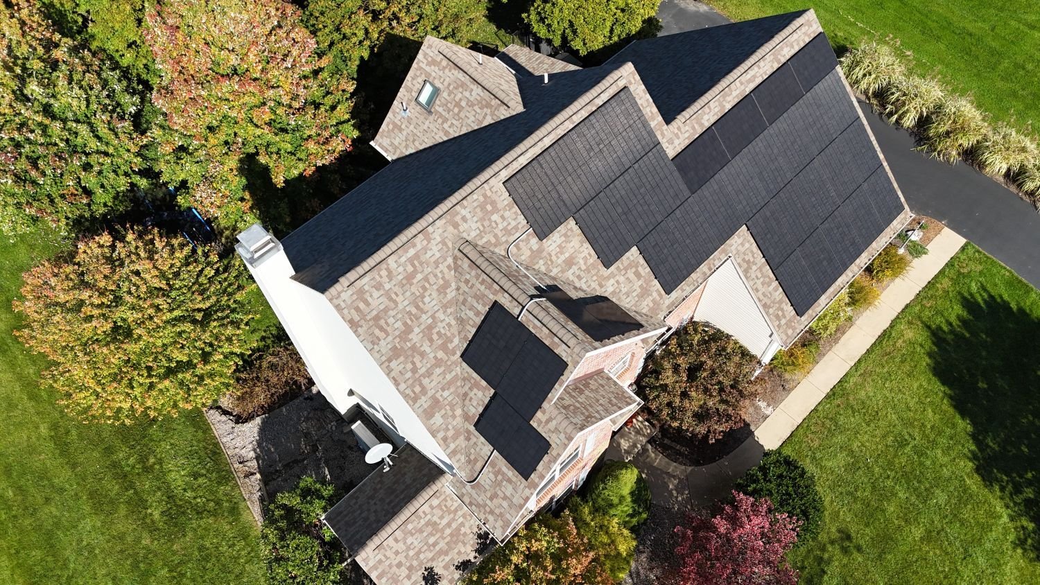 House with solar panels on back of roof