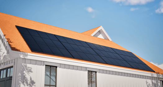 solar panel installers. house with solar panels on the roof.